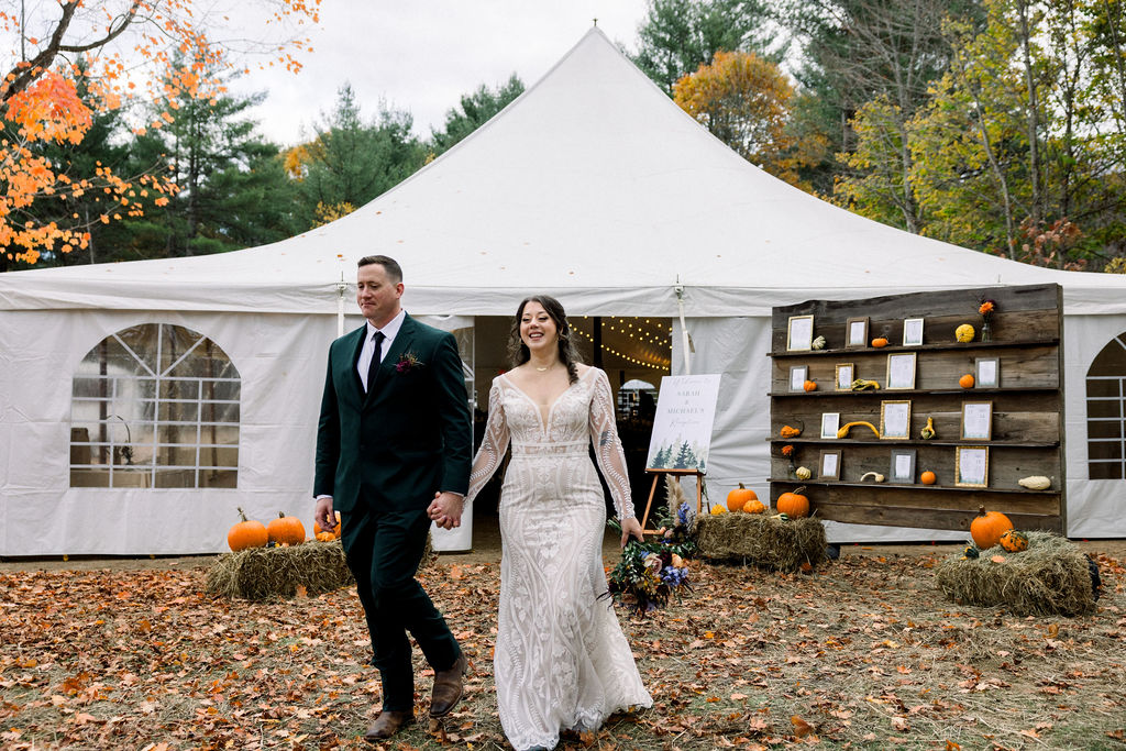 White reception tent set on an autumn field at Alpine Garden