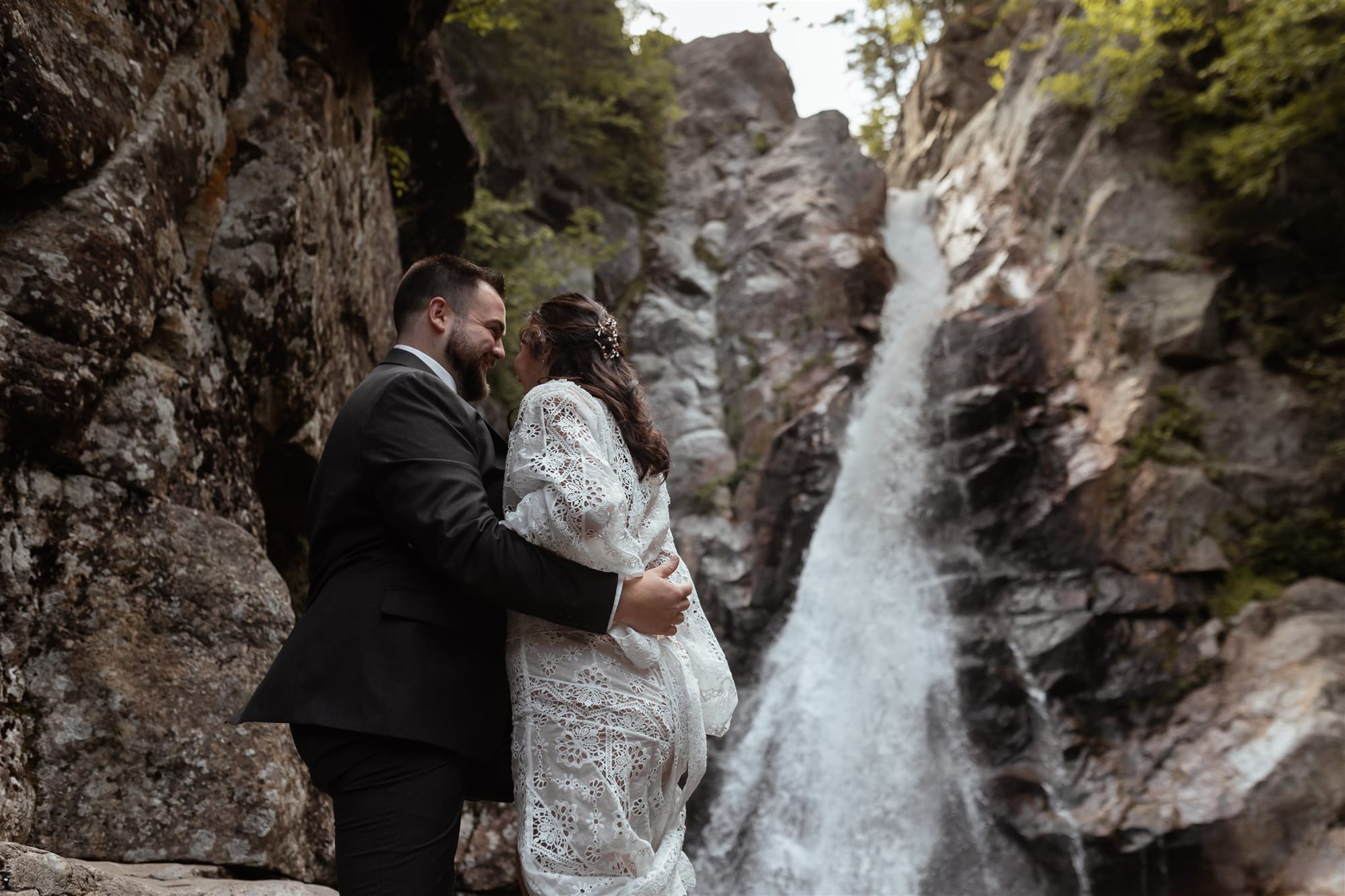 Intimate vow exchange at a New Hampshire waterfall